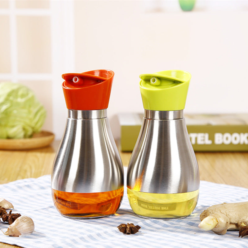 Stainless Steel Rotating Oil Dispenser with Glass Bottle